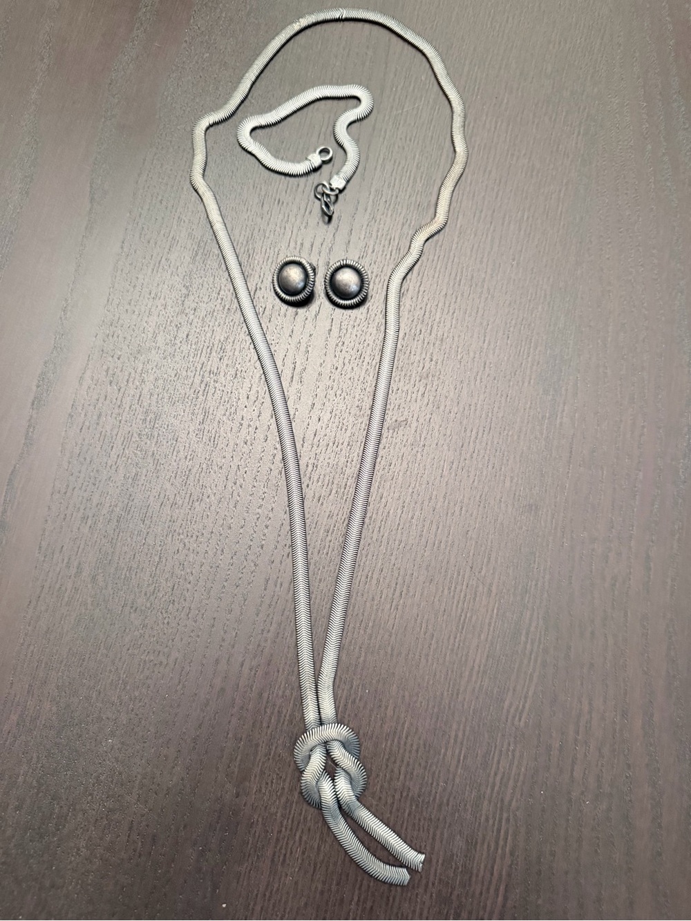 Elegant Silver-Tone Knot Pendant Necklace with Matching Button Earrings